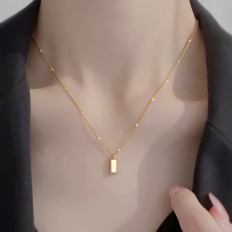 Niyanara Stainless Steel Golden Rectangular Pendant
