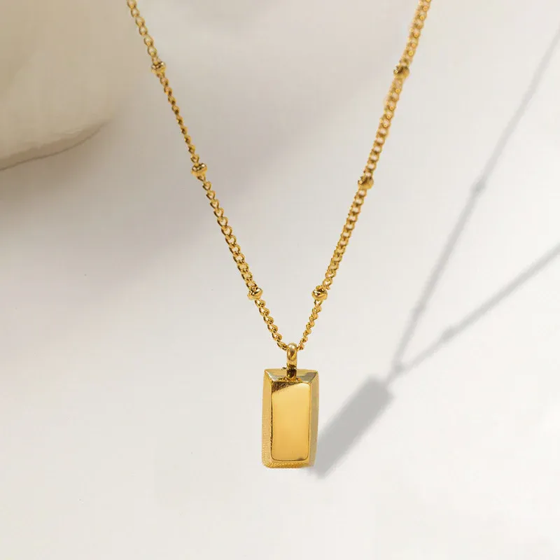 Niyanara Stainless Steel Golden Rectangular Pendant