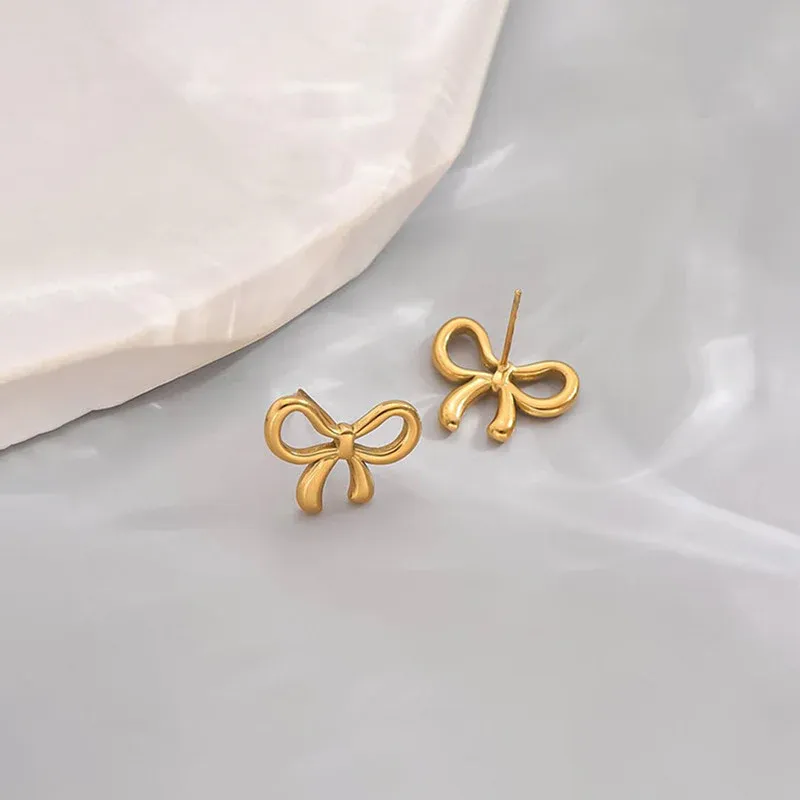 Niyanara Gold Plated Anti Tarnish Bow Themed Stud Earrings